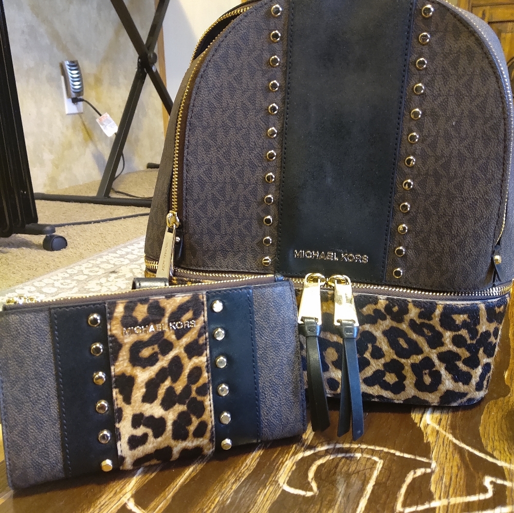 Authentic Michael Kors Haircalf backpack + wallet set